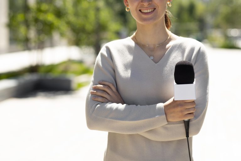 woman-holding-microphone-interview