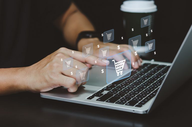 Businessman touches the cart icon